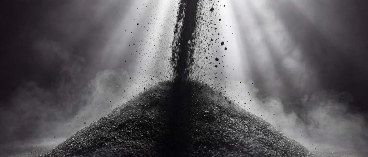 Carbon pellets pouring from the discharge